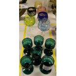 NV- a set of 6 cut coloured glass wine goblets and a set of 6 dark green glass goblets