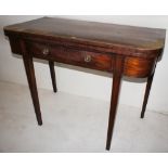 NV- an inlaid mahogany rectangular topped fold over tea table with one drawer on tapered legs