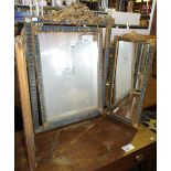 NV- a triple dressing mirror in a decorative gilt work frame