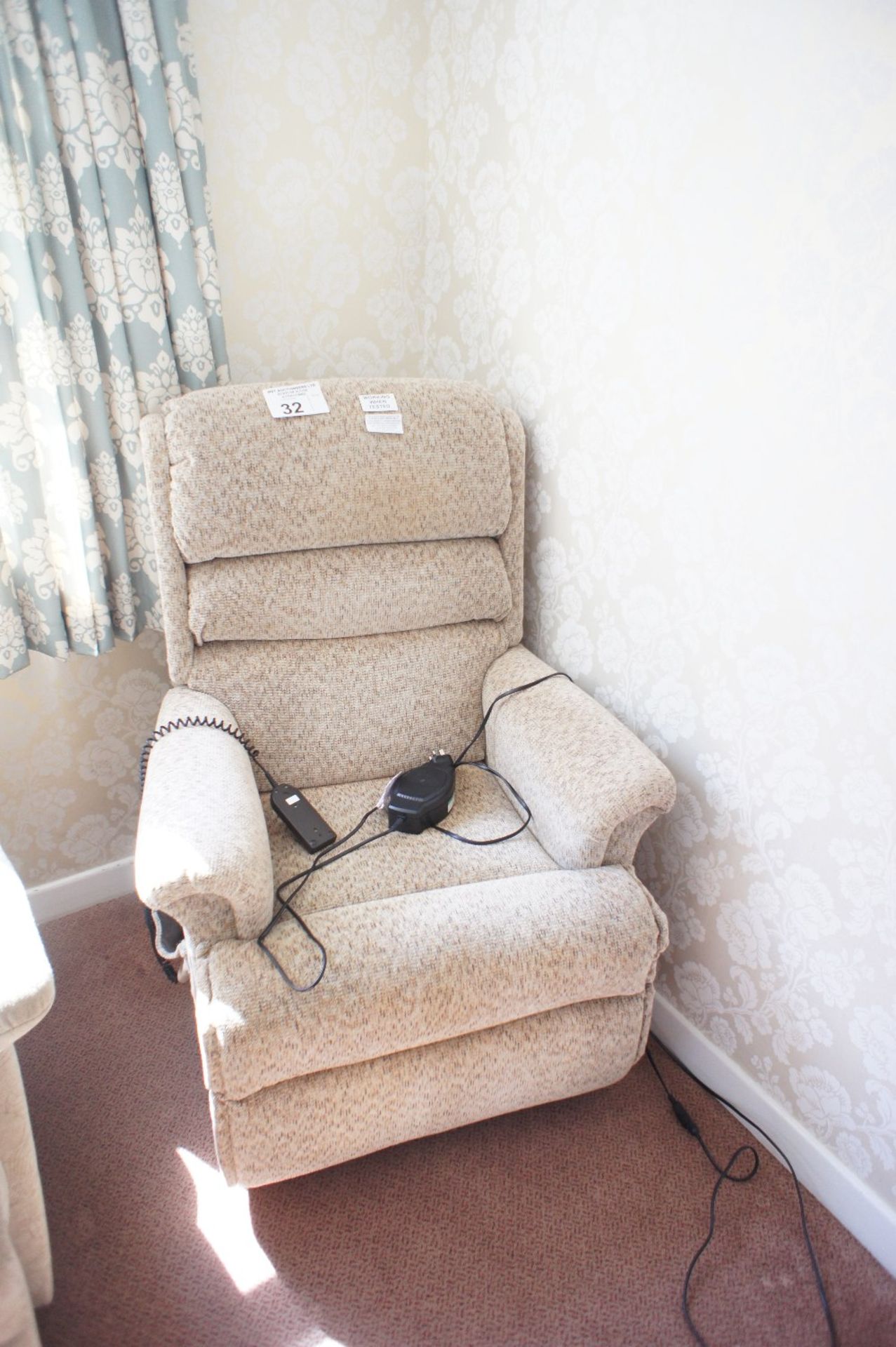 1 fawn upholstered electrically operated recliner chair (located in room 13 Burrow House,
