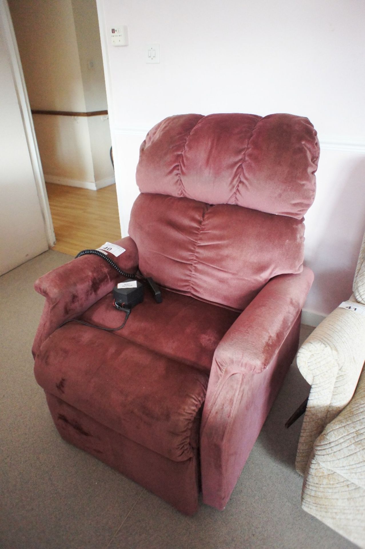 1 electrically operated recliner chair in maroon upholstery (requires attention) (located in room