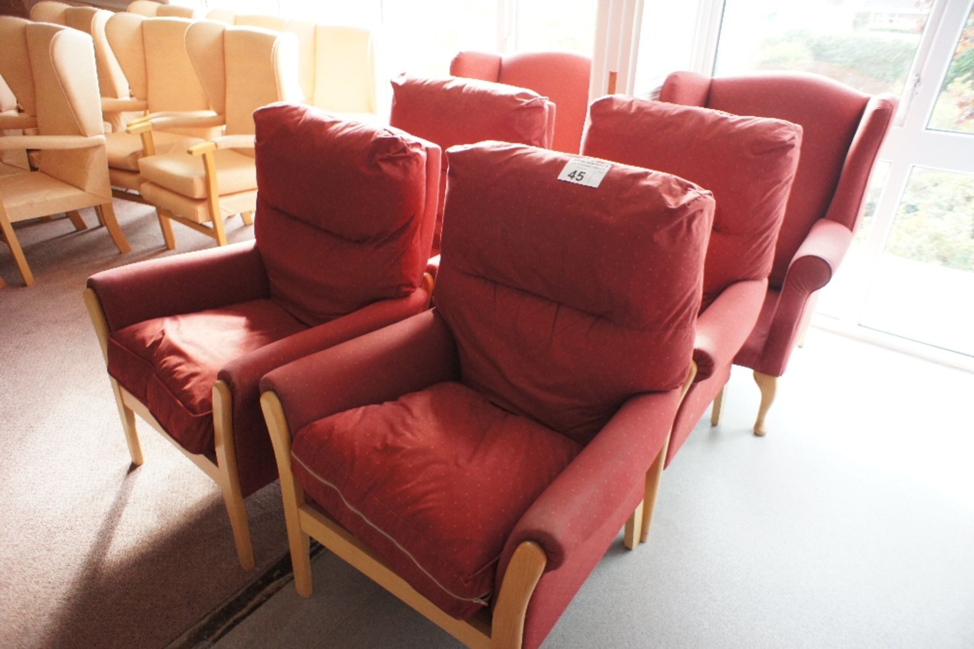 6 various red easy clean upholstered armchairs (located in room 18, Davey Court)