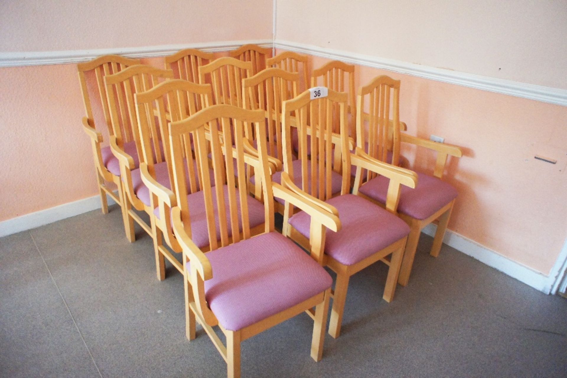12 lightwood framed canteen armchairs with pink easy clean upholstered seats (located in room 17,