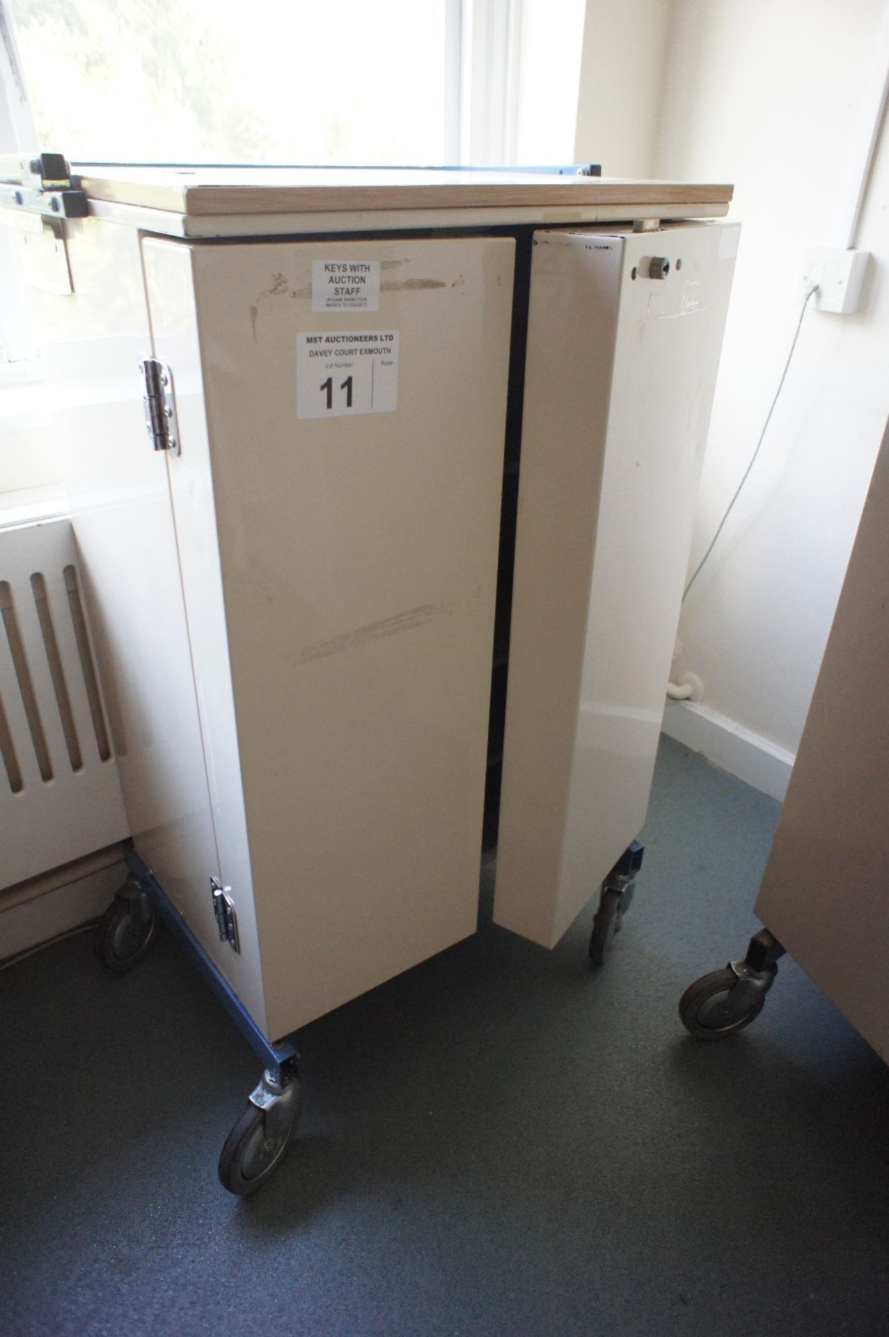 1 two door locking drugs/pharmacy trolley (located in room 3, Davey Court)