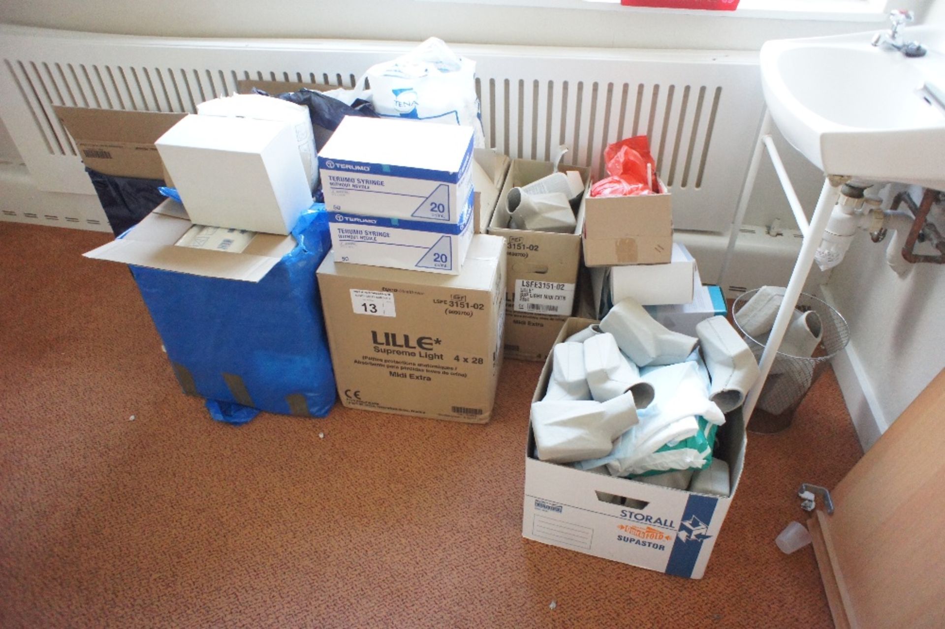 a quantity of miscellaneous incontinence pads, urine bottles and syringes etc. (located in room 4,