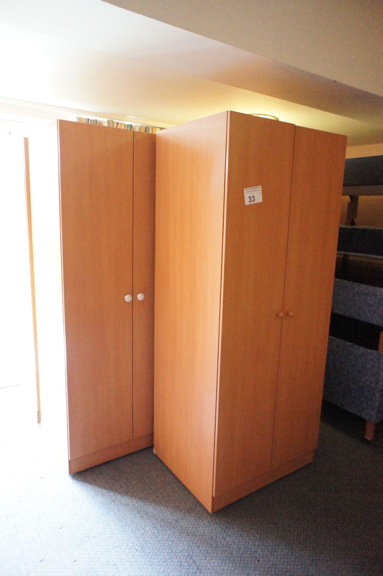 5 various woodgrained finished two door single wardrobes (located in room 16, Davey Court)