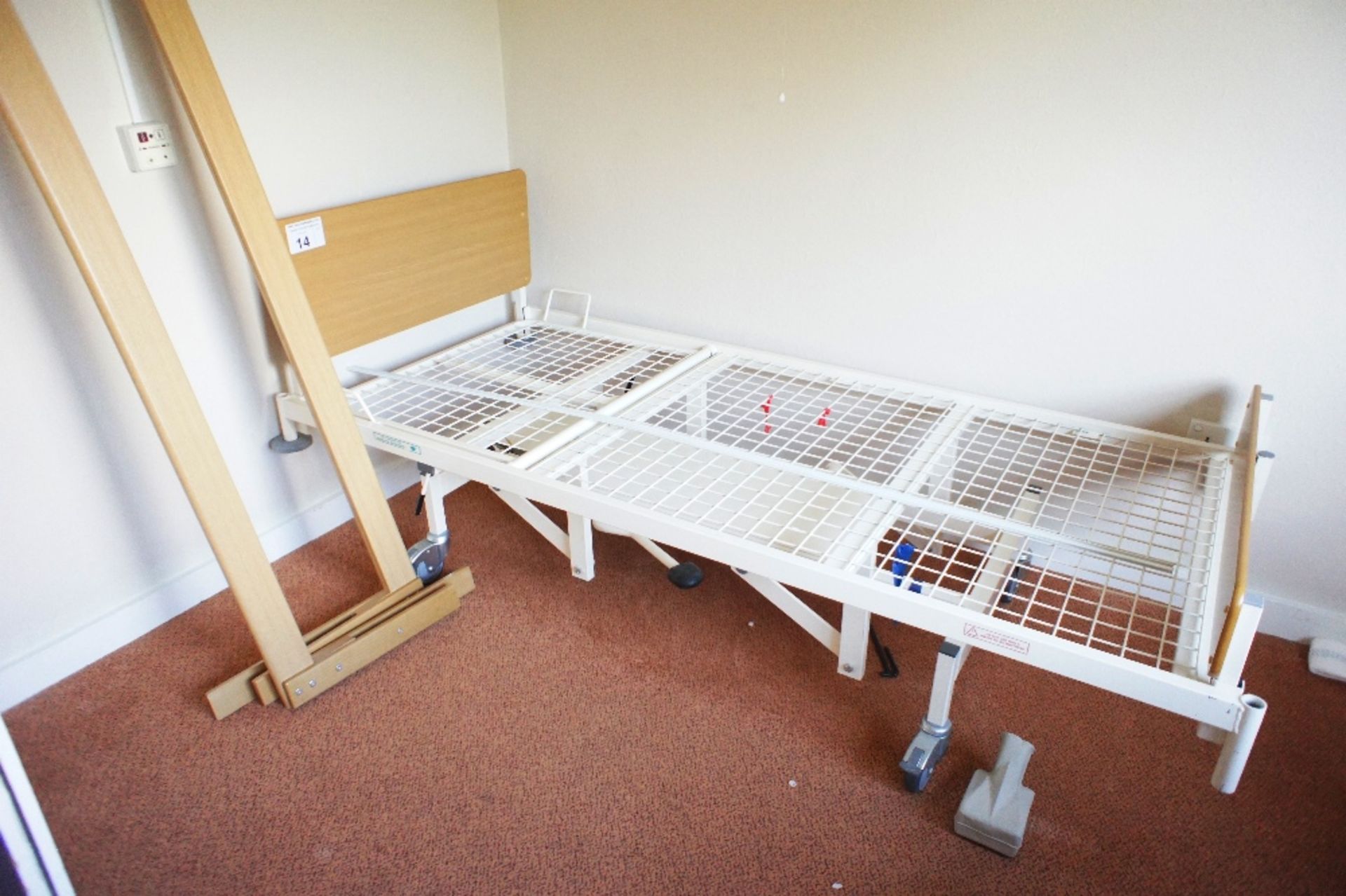 1 manually operated rise and fall patient bed (no mattress) (located in room 4, Davey Court)