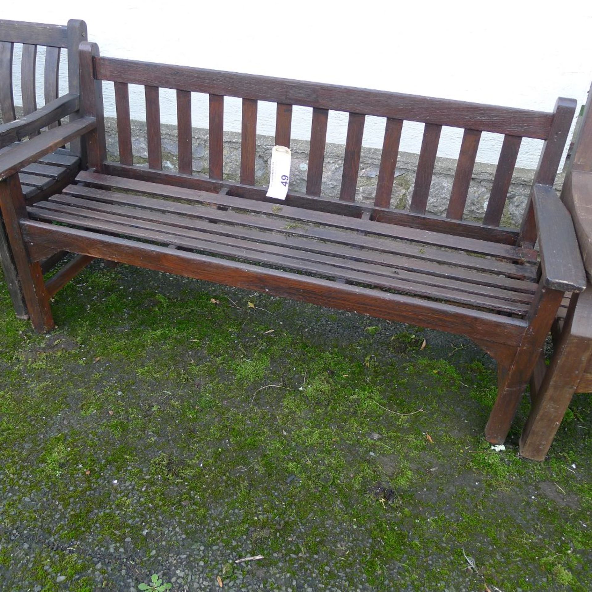 1 three seater timber garden bench (located outside junior school)