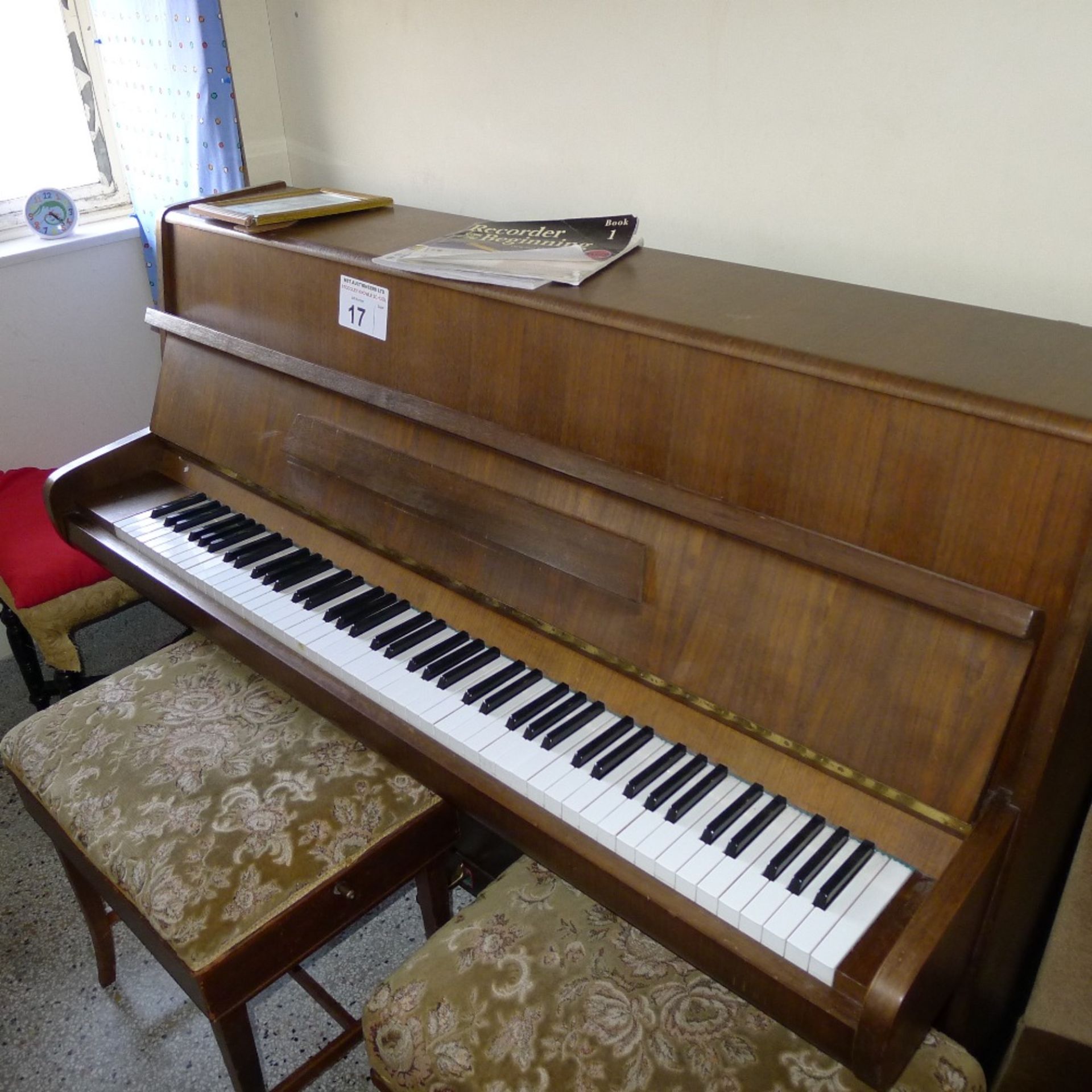 1 wooden cased upright piano (make not visible) (located in junior school first floor)