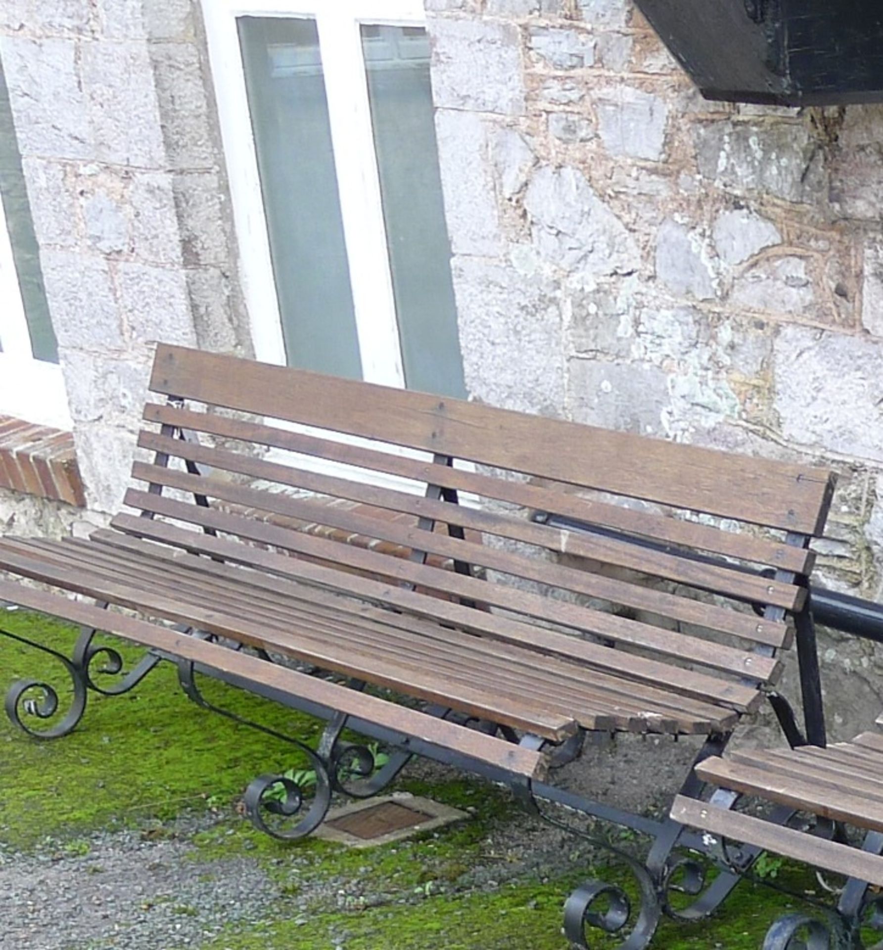 1 four seater timber garden bench (located outside junior school)