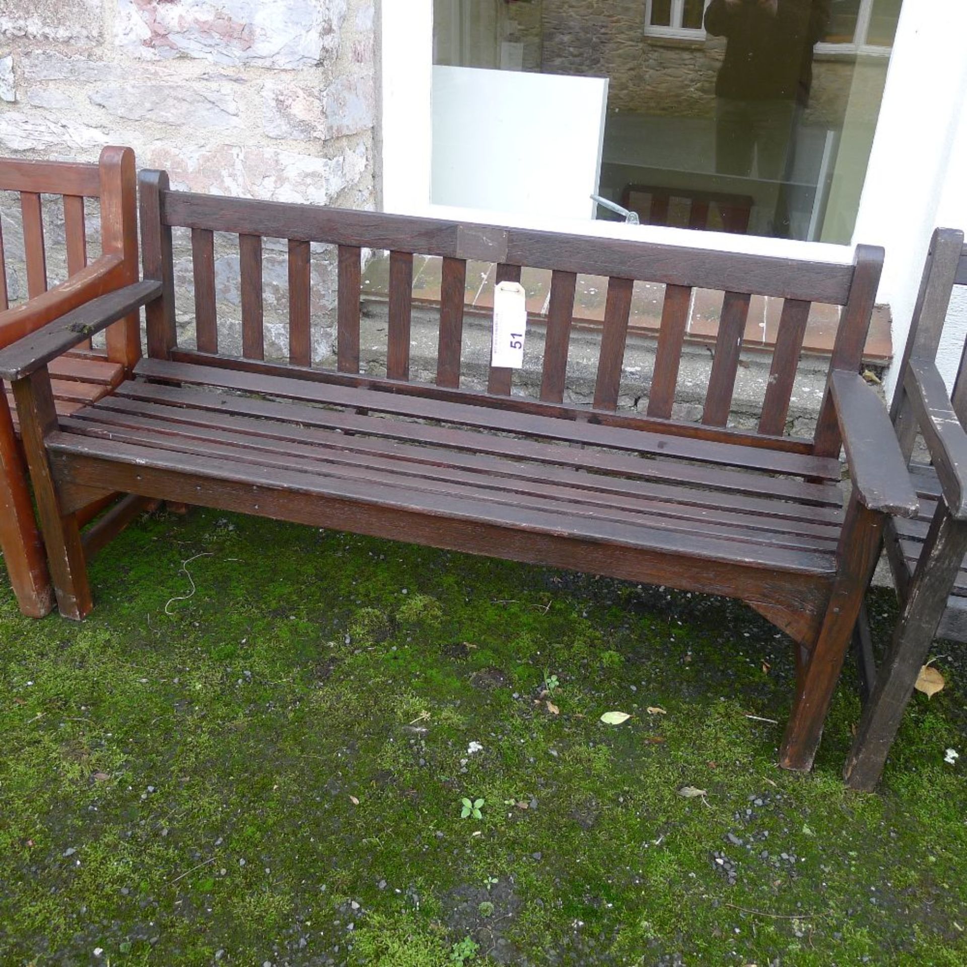 1 three seater timber garden bench (located outside junior school)