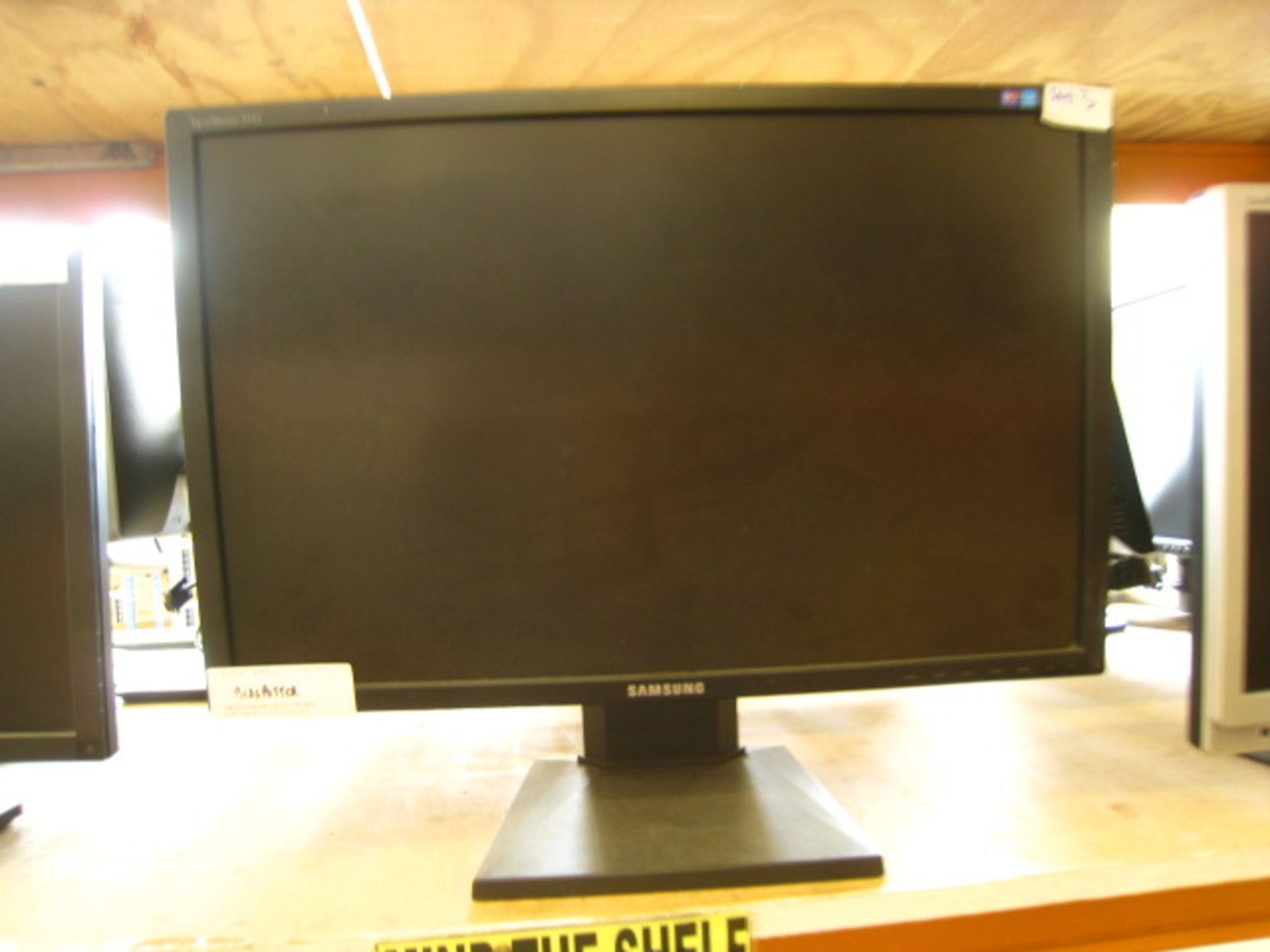 Samsung Syncmaster 2443 24" flat panel monitor on desktop stand