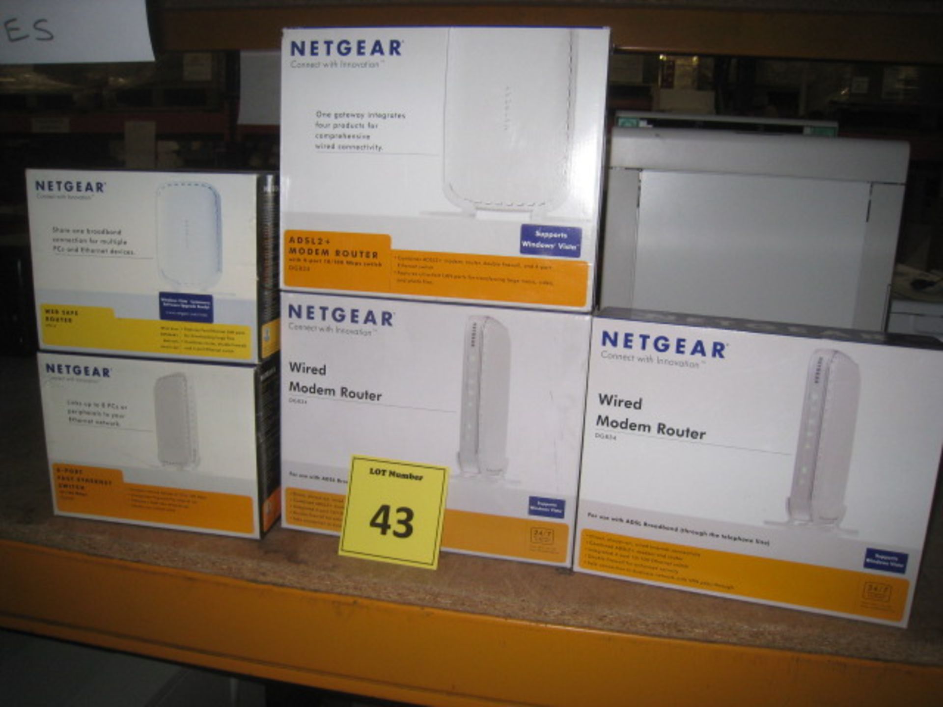 5 x boxed Netgear modem/router/switches 3 x DG834, 1 x RP614, 1 x FS 608 plus 5 x unboxed ditto