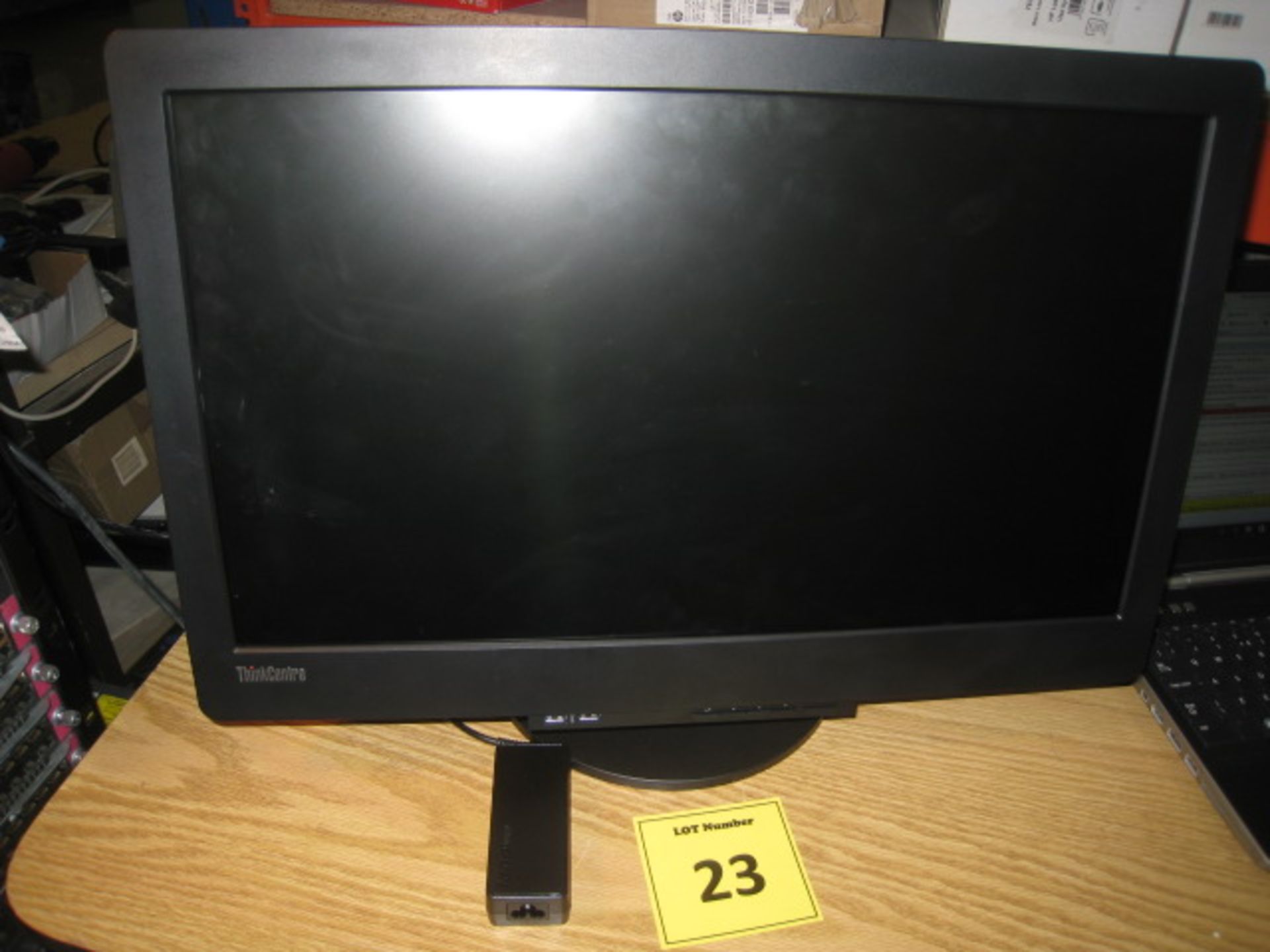 Lenovo "TINY" 23" LED LCD monitor. More info at: https://support.lenovo.com/gb/en/documents/pd100322