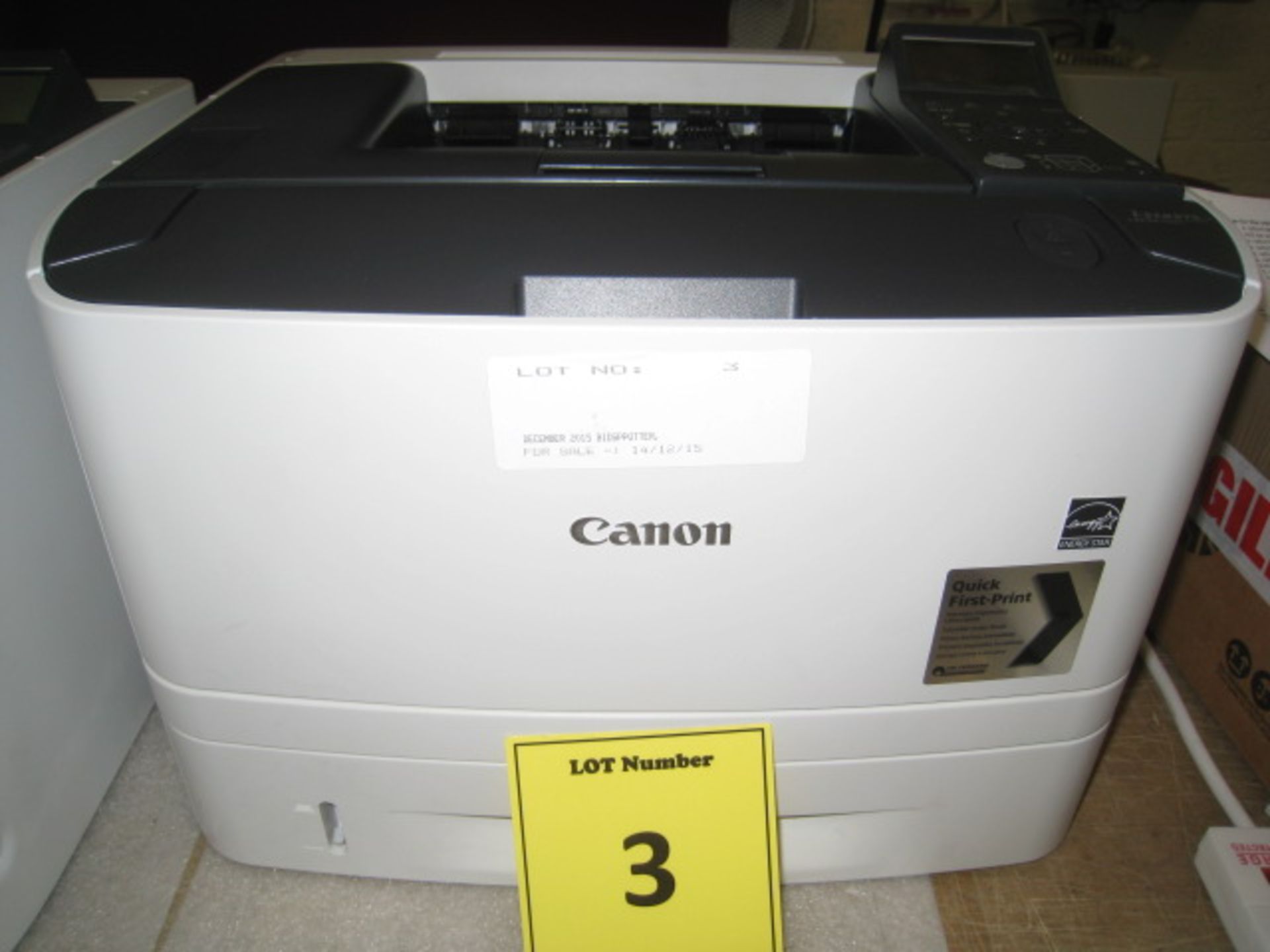 Canon i-Sense  LBP6670DN laser printer with test print. Page count 1022