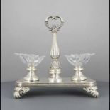 Plated-ware metal and moulded glass double salt cellar atop shapely rectangular base with four