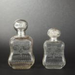 Two crystal and silver perfume bottles. Decoration of engraved ribboned bows carrying flower