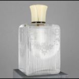 Quadrangular crystal perfume bottle with engraved decoration of fluting and festooned flower