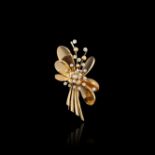 MAUBOUSSIN Yellow-gold 18K (750 milliemes) and platinum bouquet brooch set with diamonds. Signed and