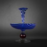 Blown glass flower stand circular base red sphere and blue tier. In the manner of English