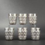 Set of six silver and silver-gilt truncated cone goblets with flat bottom and hearts decoration.