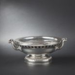 Large circular plated ware metal dish warmer atop small pedestal with pierced frieze of crossbars