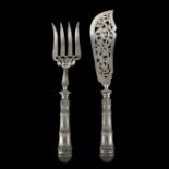 Fish flatware service set silver-mounted handles simulating bamboo branches. Silver-plated blades