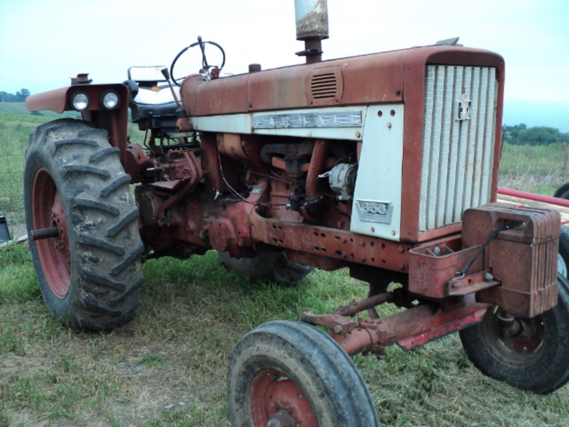 Lot 369 IH 656 gas, wide front, runs.