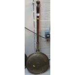Copper and brass warming pan with turned