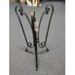 Wrought iron jardiniere stand.