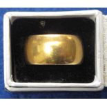 22ct gold band. 11.7g approx. In box.  CONDITION REPORT; Size G.  Surface wear with age, clear
