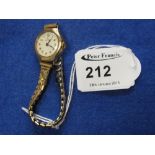 9ct gold ladies Record wrist watch.