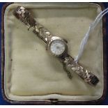 9ct gold ladies wristwatch with 9ct gold strap in box.  CONDITION REPORT; 18.7 grams