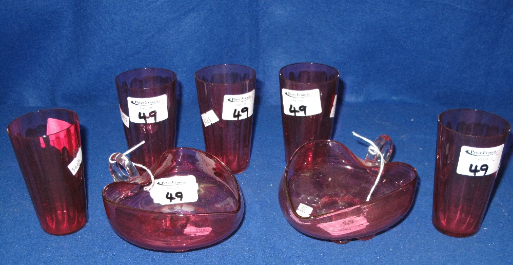 Group of assorted cranberry glass items