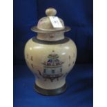 Chinese crackle ware porcelain baluster shaped vase and cover, enamel decorated with Koro designs