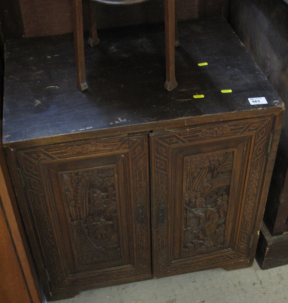 Stained hardwood collectors cabinet with