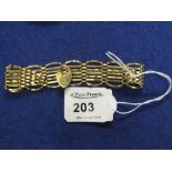 9ct gold seven bar gate bracelet.  CONDITION REPORT; 10.7 grams