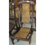 20th century stained cane folding chair.