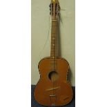 Hornby six string acoustic guitar.