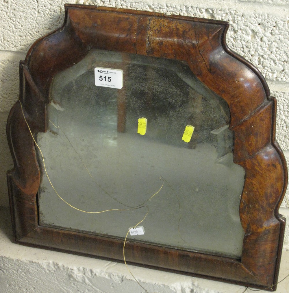 Small oval bevel plate walnut mirror.  CONDITION REPORT; Appears to be original plate, poor