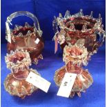 Four items of Victorian cranberry glass to include baluster shaped two handled biscuit barrel (