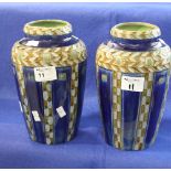 Pair of Royal Doulton Lambeth pottery shouldered tapering cylinder vases with banded geometric