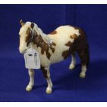 Beswick china skewbald pony.  CONDITION REPORT: Crazed but no obvious damage