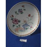 Chinese porcelain fluted dish, decorated with enamel foliate designs. Unmarked. CONDITION REPORT: