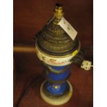 19th Century style gilt metal and porcelain mounted lamp base decorated with rams head mounts,