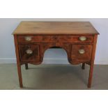 LATE GEORGIAN INLAID MAHOGANY LOW BOY OR DRESSING TABLE having strung outlined top with moulded edge