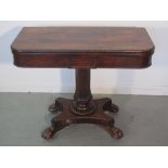 Mid 19th Century rosewood fold over Tea Table having bead moulded edge over panel frieze, standing