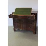 18th CENTURY MAHOGANY SERPENTINE FRONTED FITTED BACHELOR'S CHEST OF FOUR GRADUATED DRAWERS, having