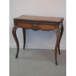 19th CENTURY FRENCH WALNUT FOLD OVER SERPENTINE CARD TABLE, the top with quarter veneers and broad