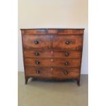 EARLY 19th CENTURY MAHOGANY SECRETAIRE CHEST OF DRAWERS having moulded edge top above foliate inlaid